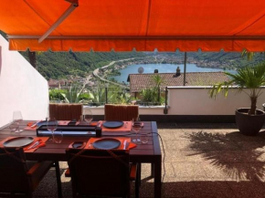 Exklusive Zweizimmerwohnung mit Pool und Seesicht